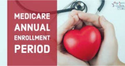 Hands cupping a foam heart, with the words 'Medicare Annual Enrollment Period' to the left of the hands